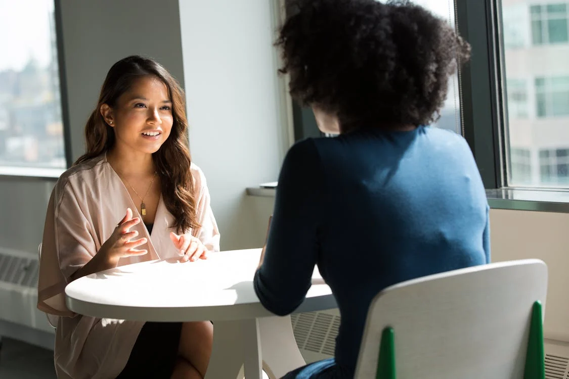 A private investigator interviewing a witness