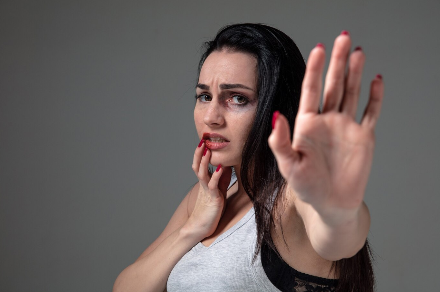 a woman in fear of domestic abuse and violence