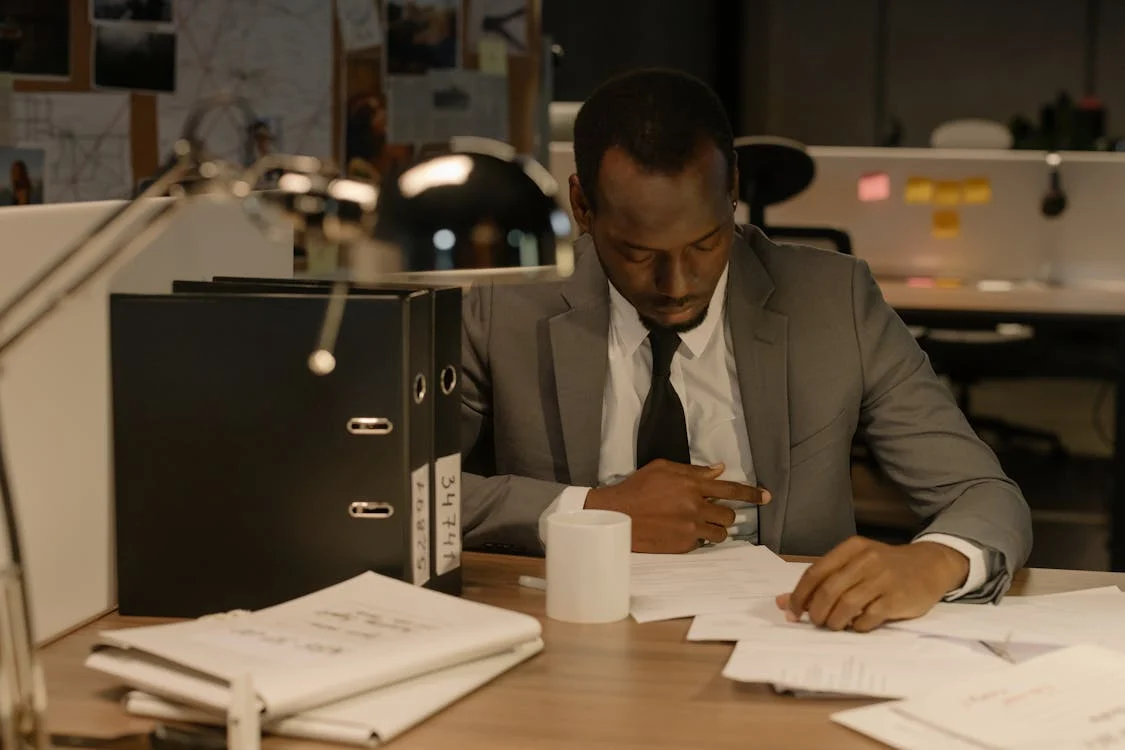 A private investigator reviewing confidential documents.